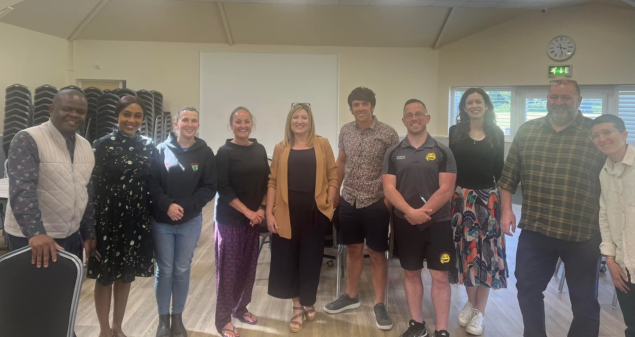 A group of people standing for a picture