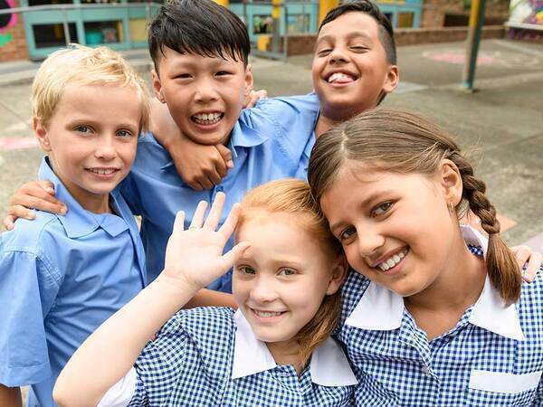 5 children posing for picture