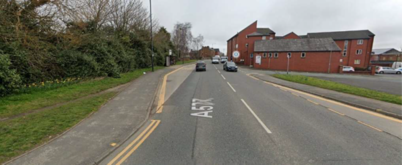 Manchester Road seen from the junction with Holt Street, looking east towards the playing fields.